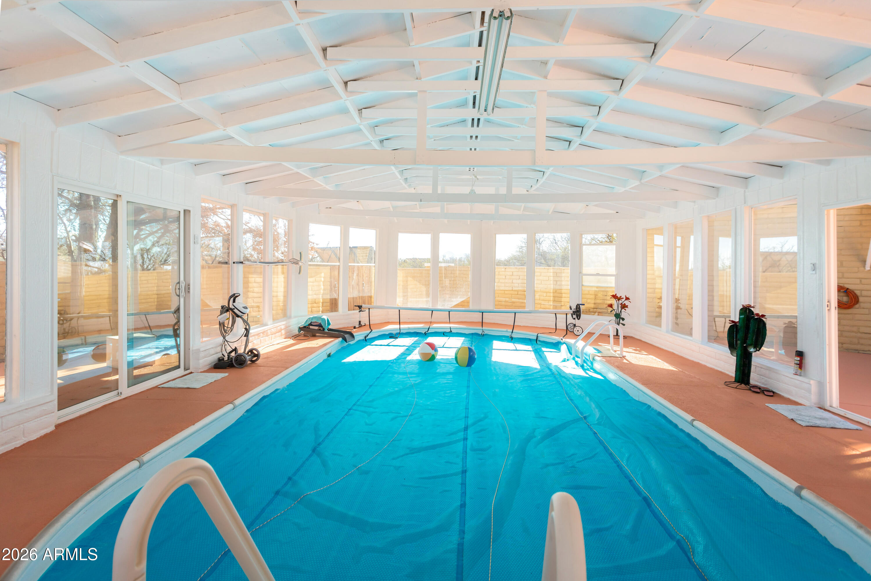 5681 South Moson Road Hereford, AZ 85615 - Photo 11 of 47 a room with pool table and large windows