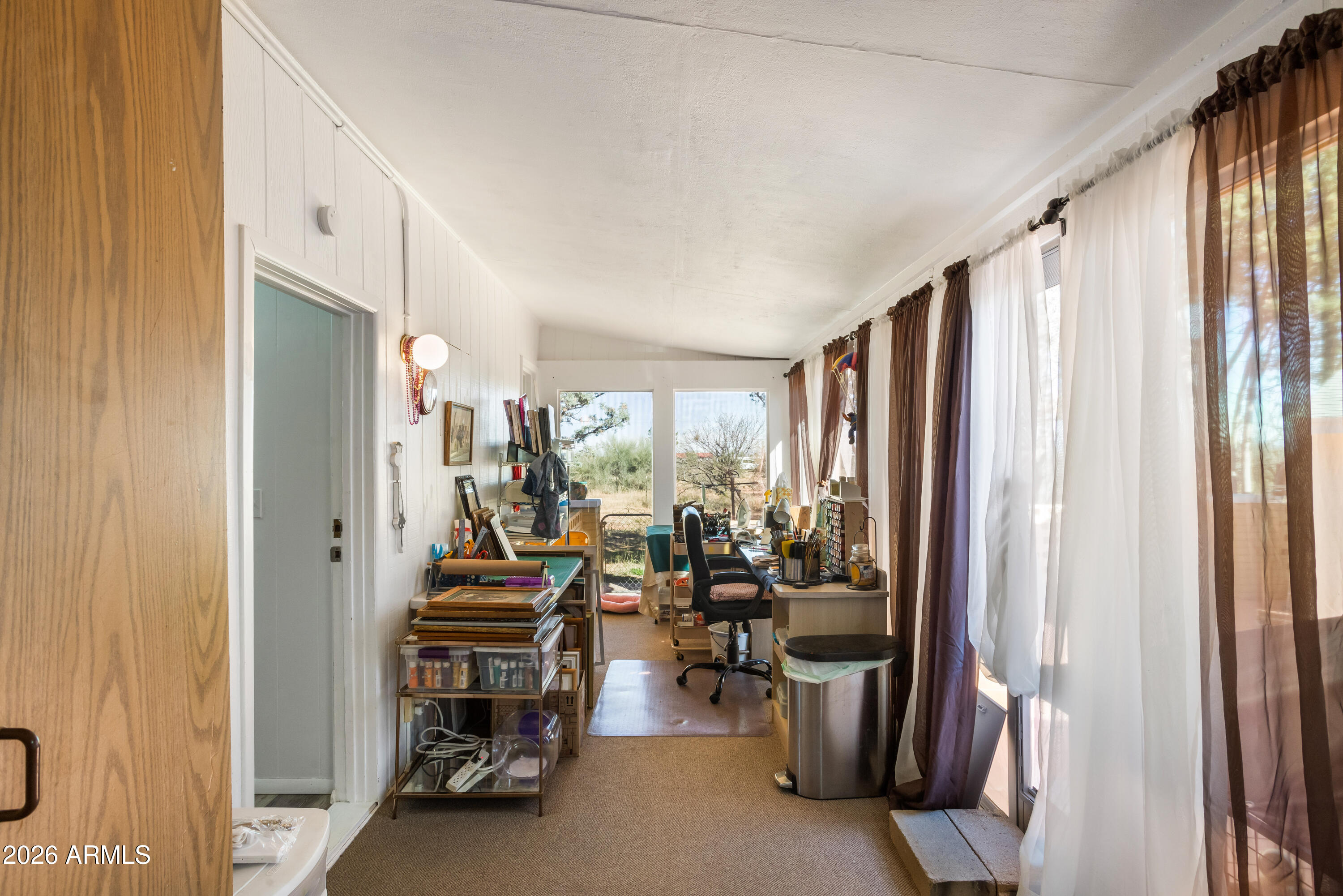 5681 South Moson Road Hereford, AZ 85615 - Photo 16 of 47 a view of a room with gym equipment