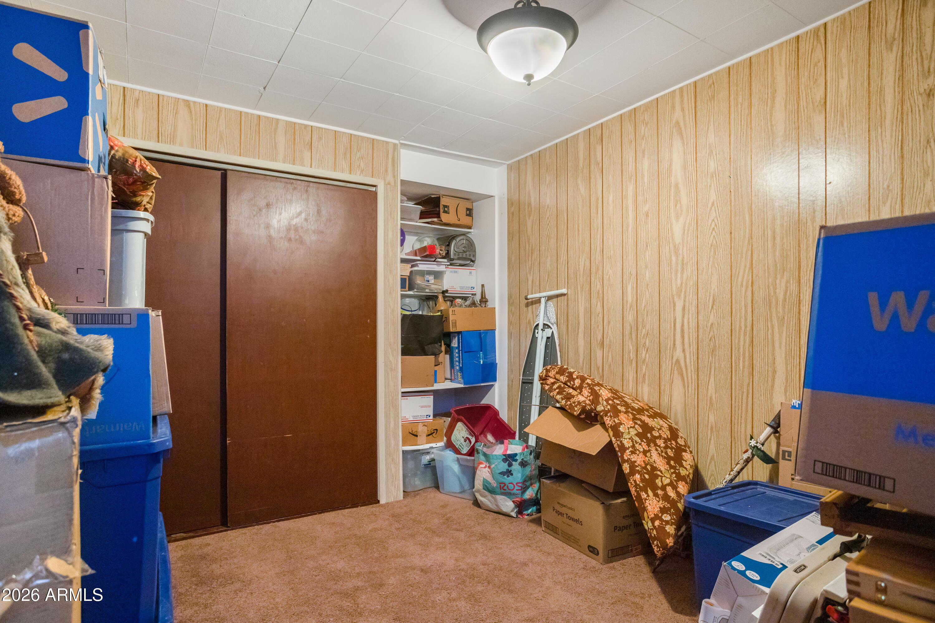 5681 South Moson Road Hereford, AZ 85615 - Photo 25 of 47 a bedroom with furniture and a fan