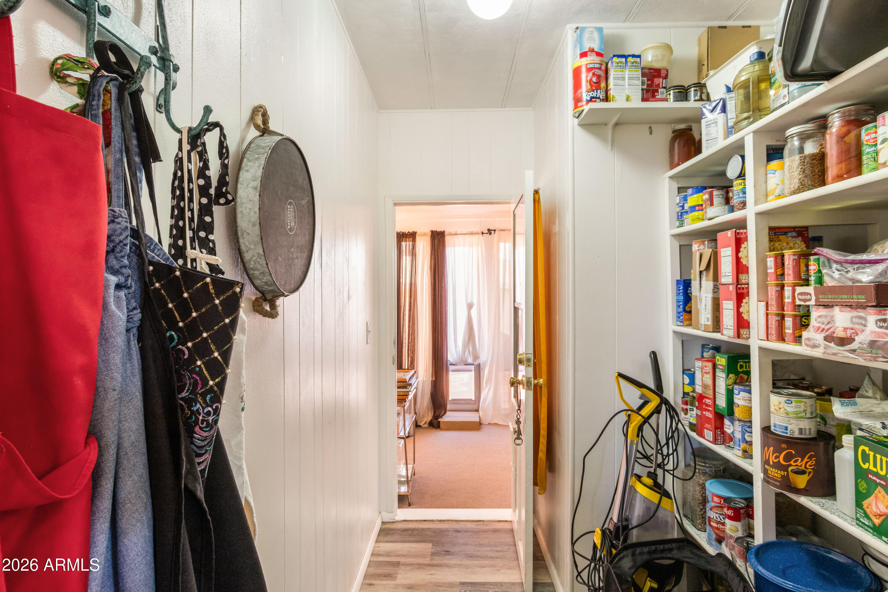 5681 South Moson Road Hereford, AZ 85615 - Photo 30 of 47 a view of an entryway with furniture and toys