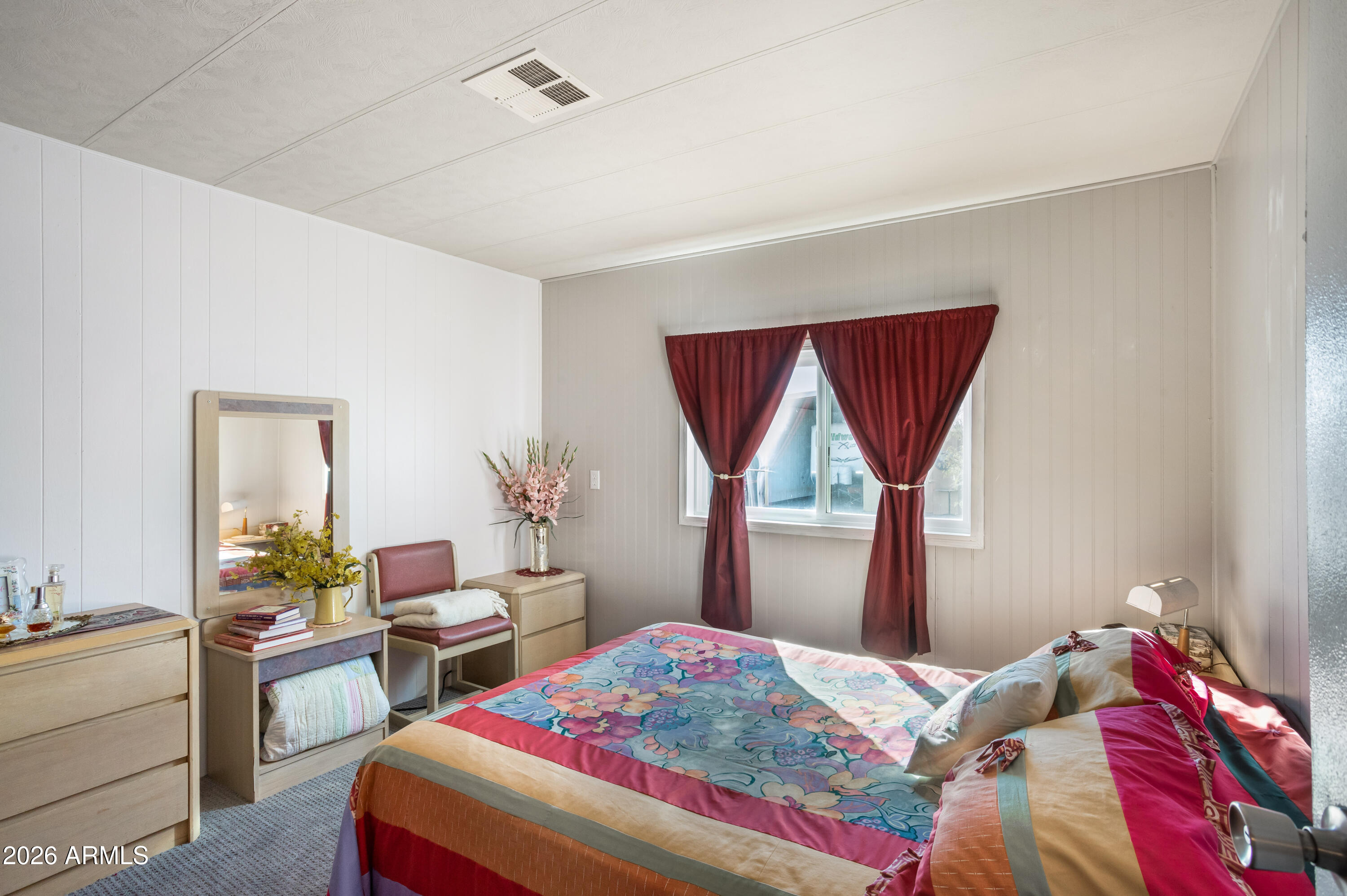 5681 South Moson Road Hereford, AZ 85615 - Photo 42 of 47 a bedroom with a bed and a window