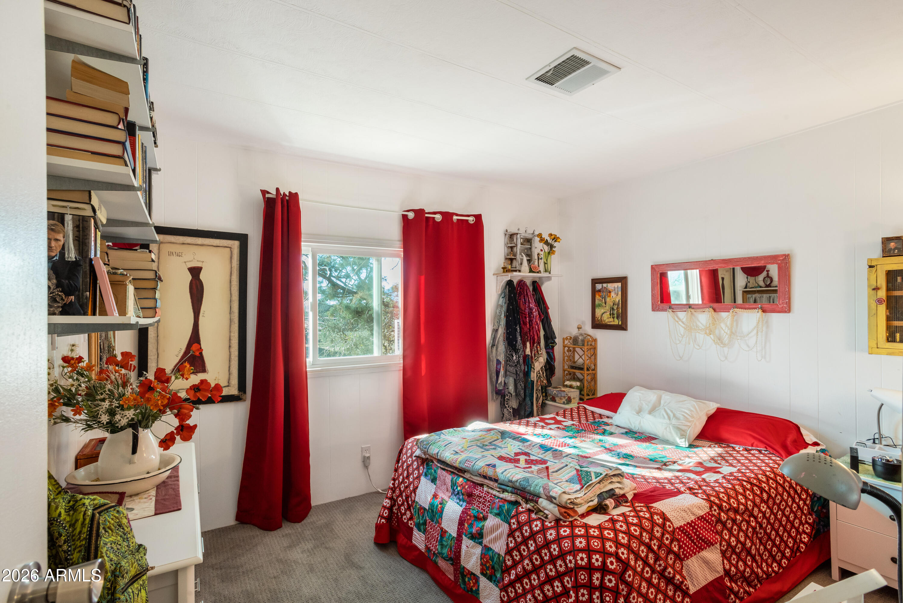 5681 South Moson Road Hereford, AZ 85615 - Photo 44 of 47 a bedroom with a bed and a window