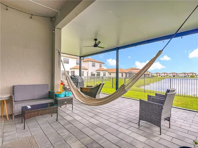 a view of a swimming pool with a porch