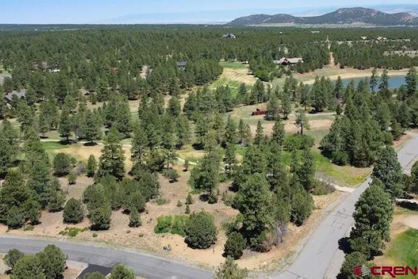 an aerial view of residential house with an outdoor space