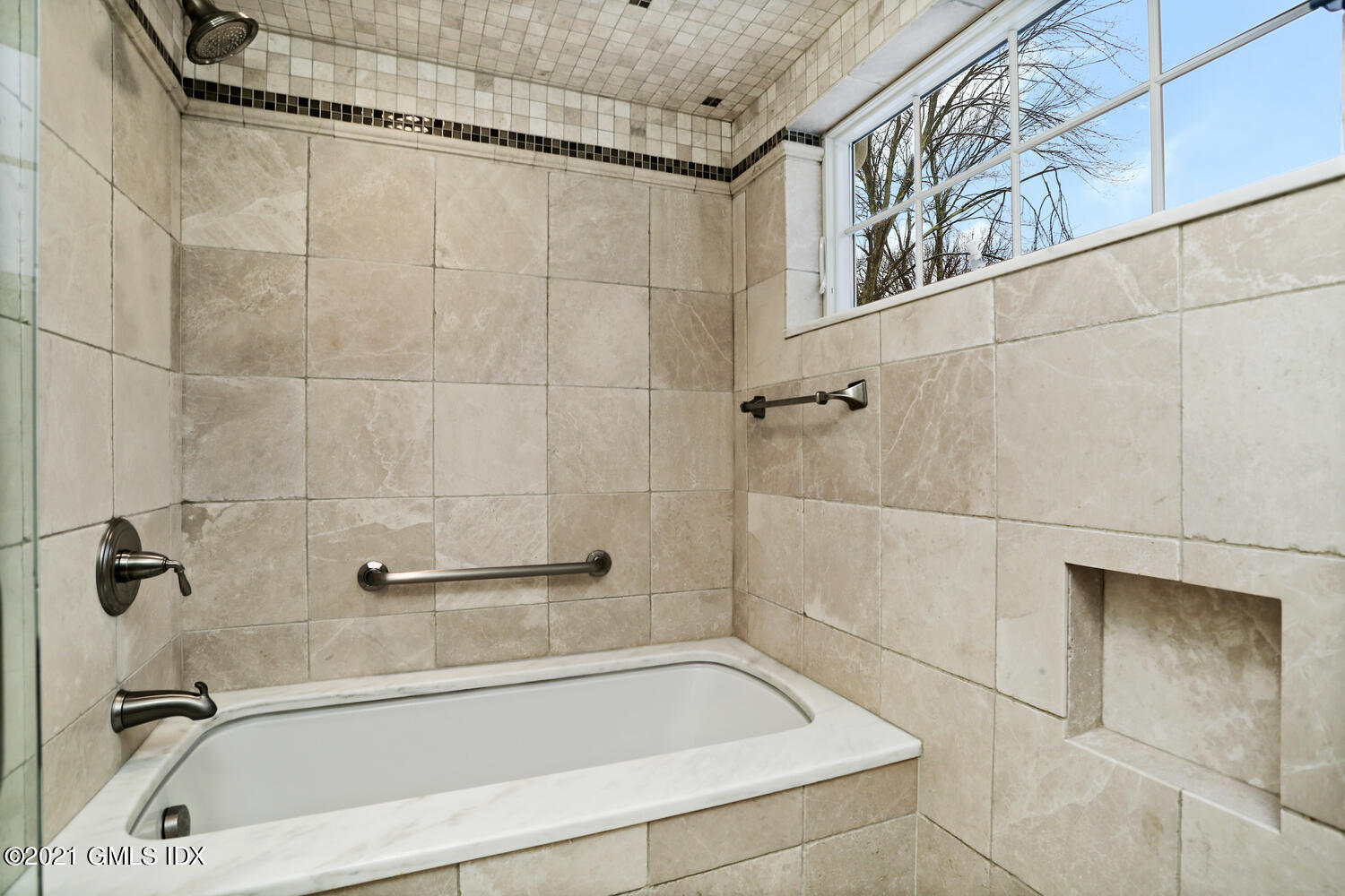 56 Old Orchard Road Riverside, CT 06878 - Photo 20 of 39 a bathroom with a tub