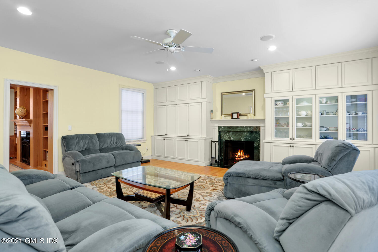 56 Old Orchard Road Riverside, CT 06878 - Photo 8 of 39 a living room with furniture and a fireplace