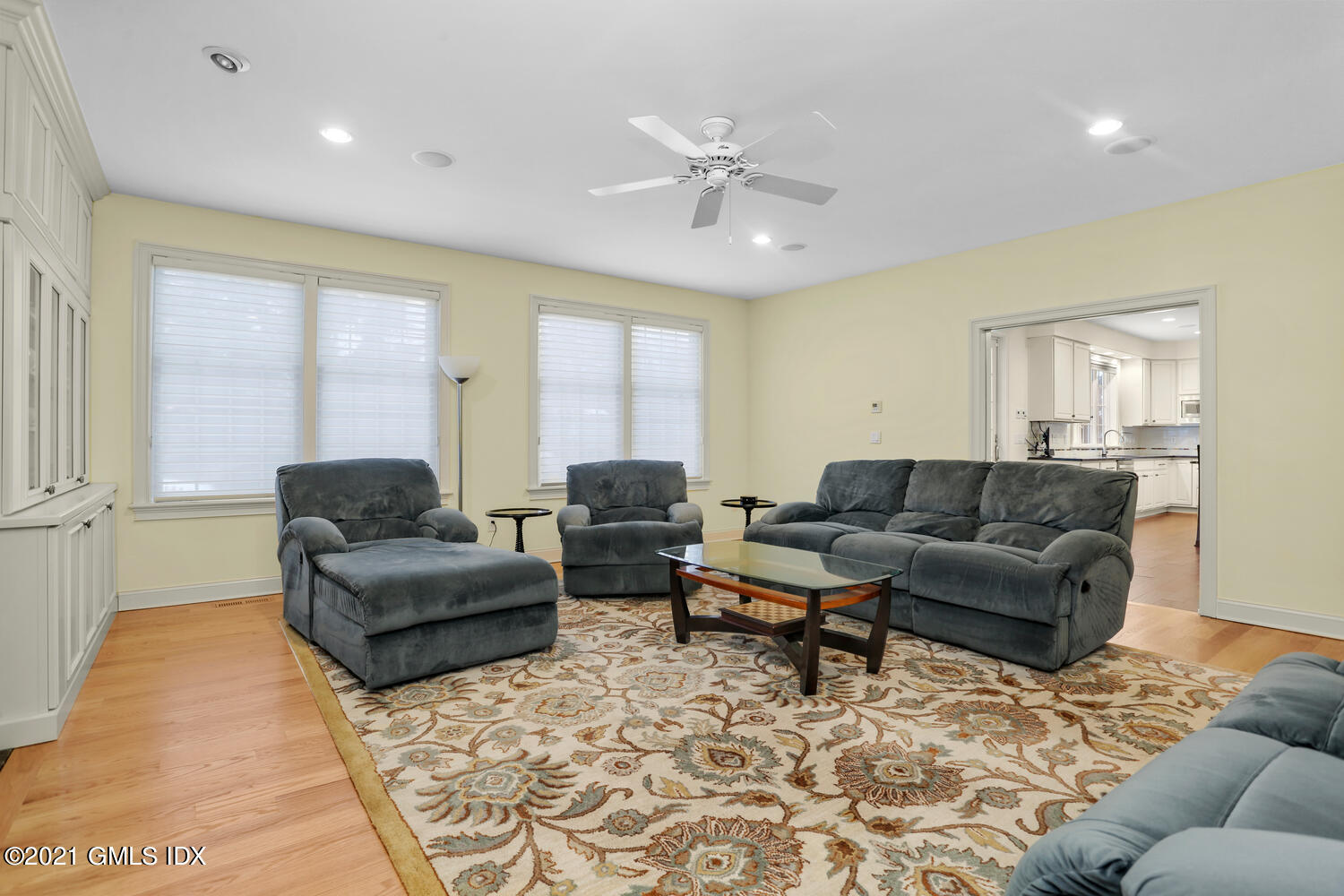 56 Old Orchard Road Riverside, CT 06878 - Photo 9 of 39 a living room with furniture and a large window