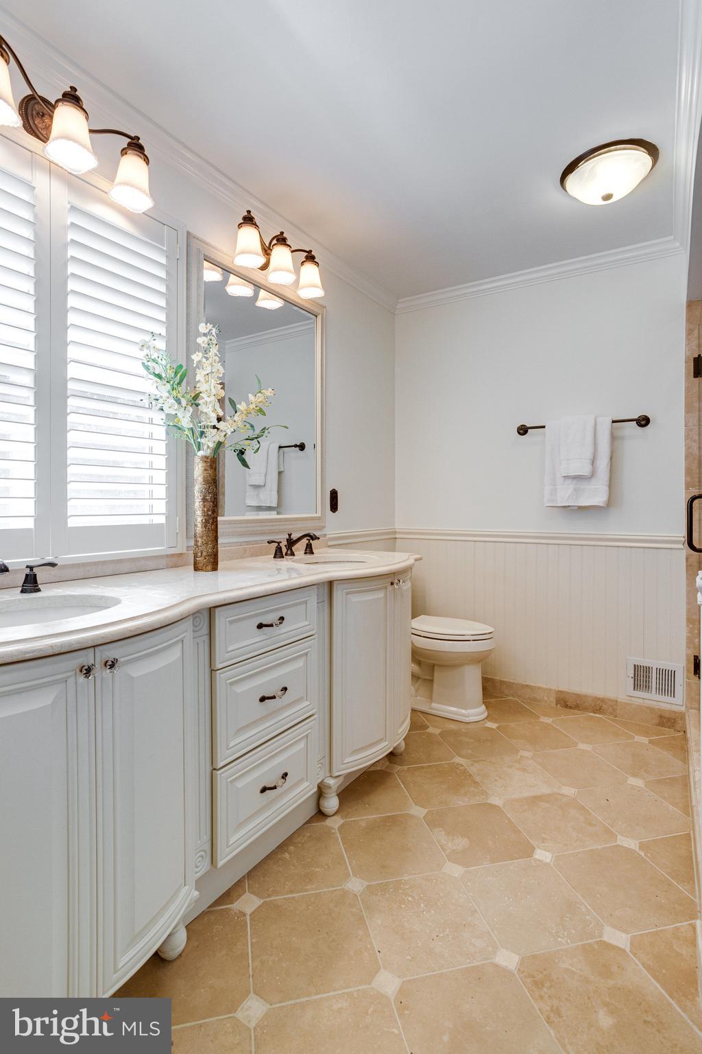 8325 Lindside Way Springfield, VA 22153 - Photo 29 of 63 Bathroom features classic travertine flooring