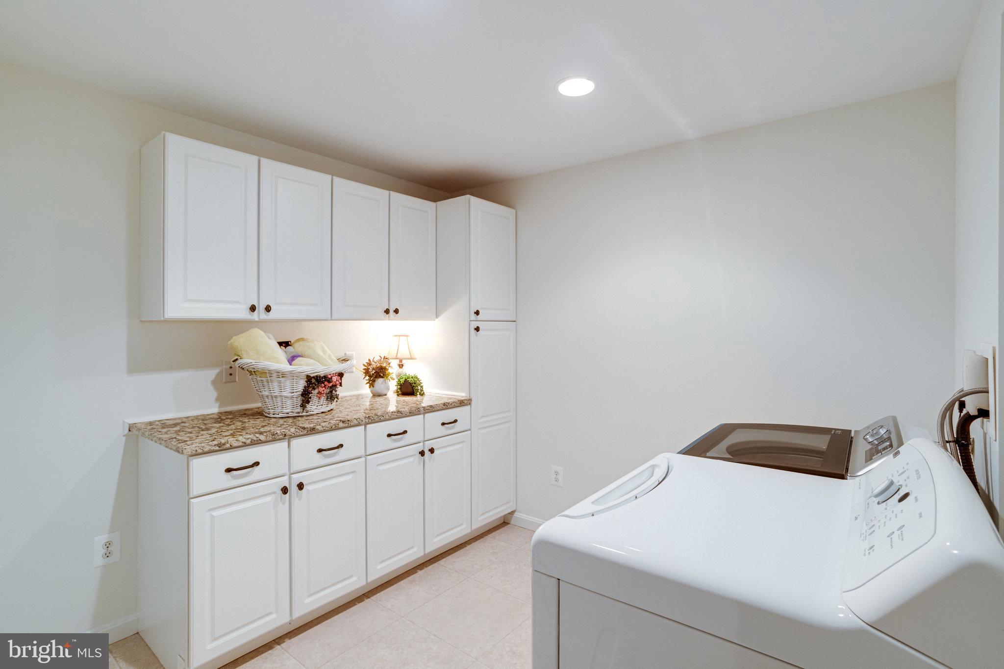 8325 Lindside Way Springfield, VA 22153 - Photo 48 of 63 Granite counters and built in cabinets