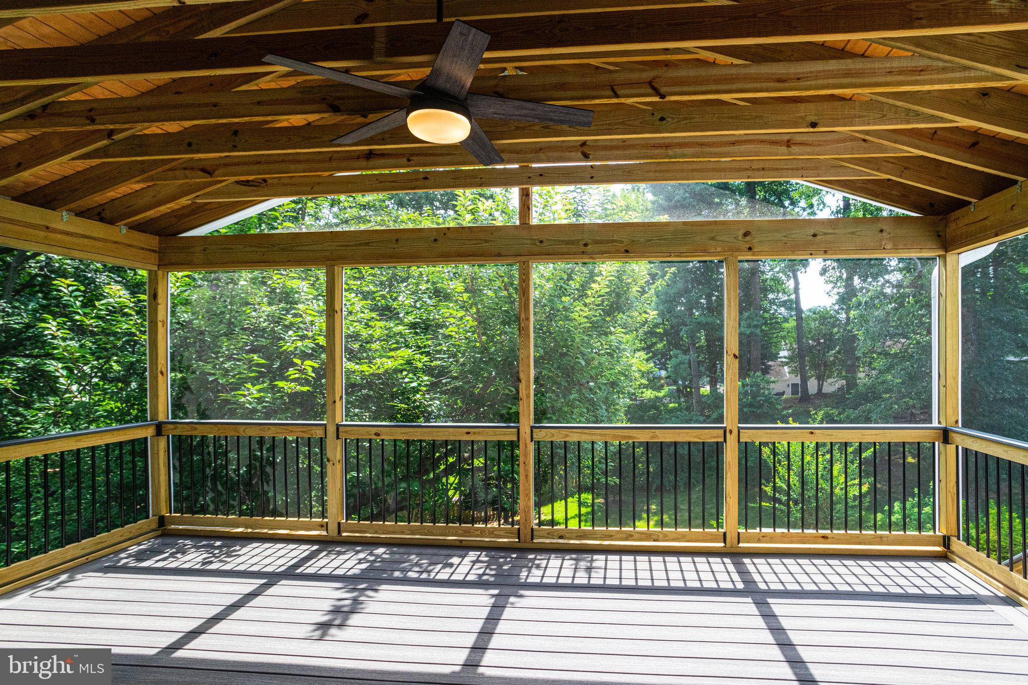 8325 Lindside Way Springfield, VA 22153 - Photo 50 of 63 Vaulted wood ceiling with fan and backyard views
