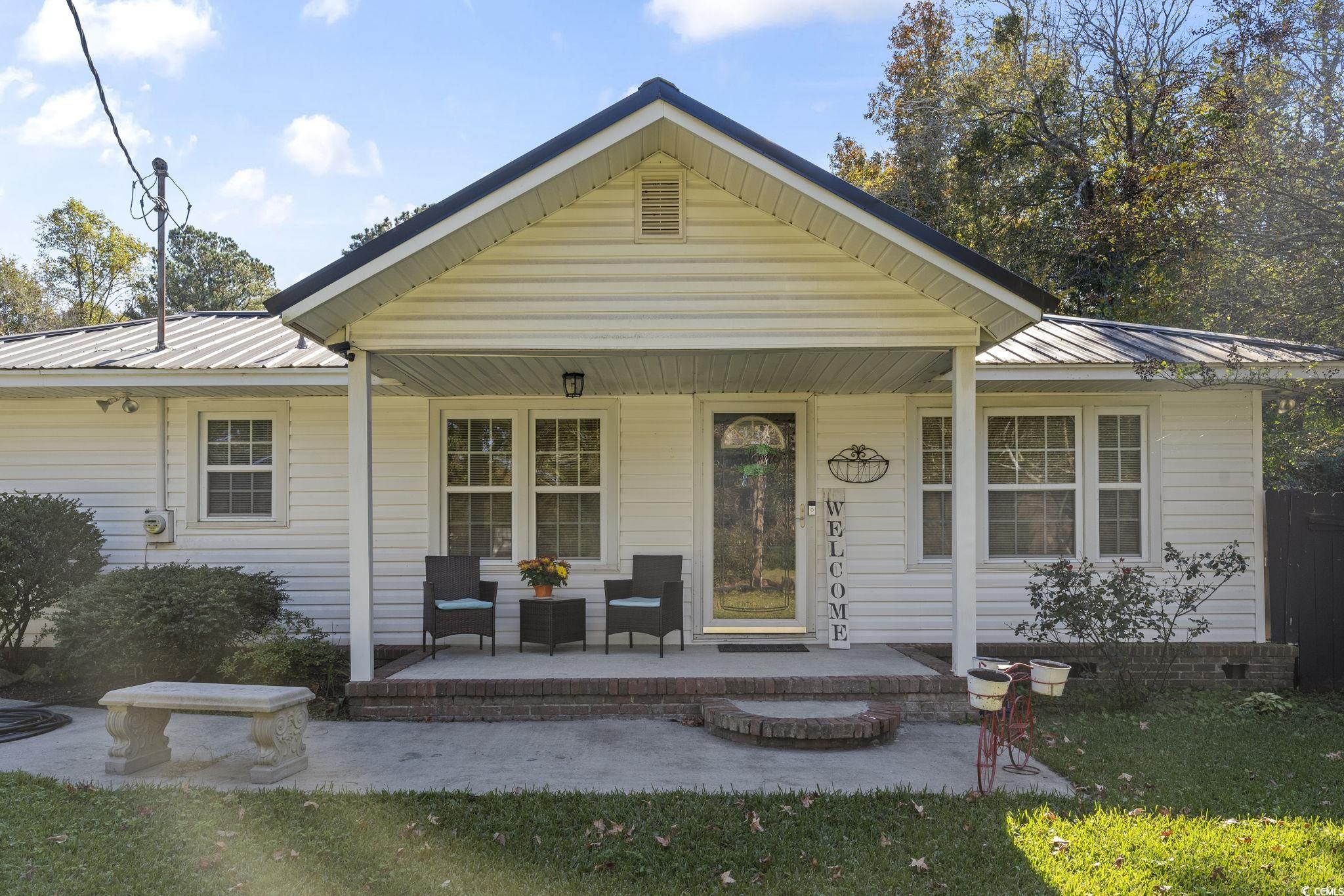 1028 Holt Road Conway, SC 29526 - Photo 23 of 29 Bungalow-style home with a porch and a metal roof