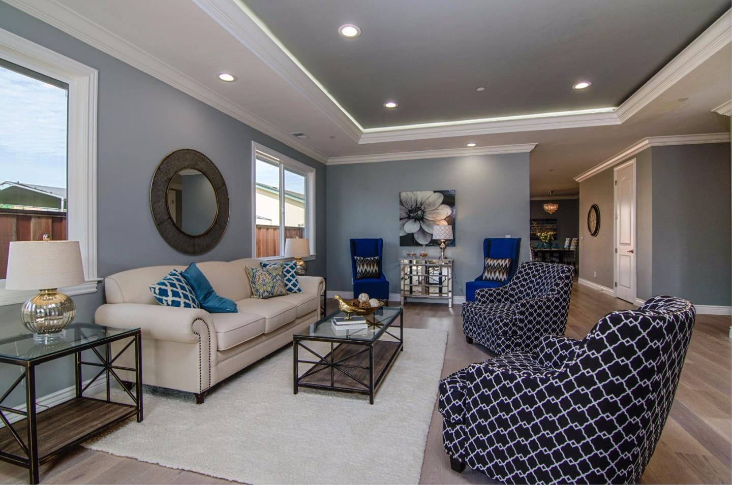 847 Muender Avenue Sunnyvale, CA 94086 - Photo 3 of 15 a living room with furniture and a large window