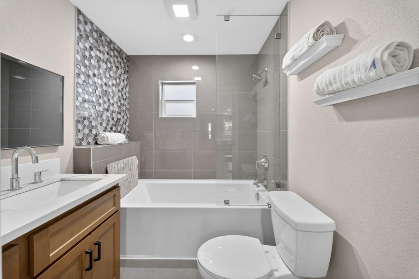 919 Old Canyon Road Fremont, CA 94536 - Photo 37 of 55 a bathroom with a sink a toilet and bathtub