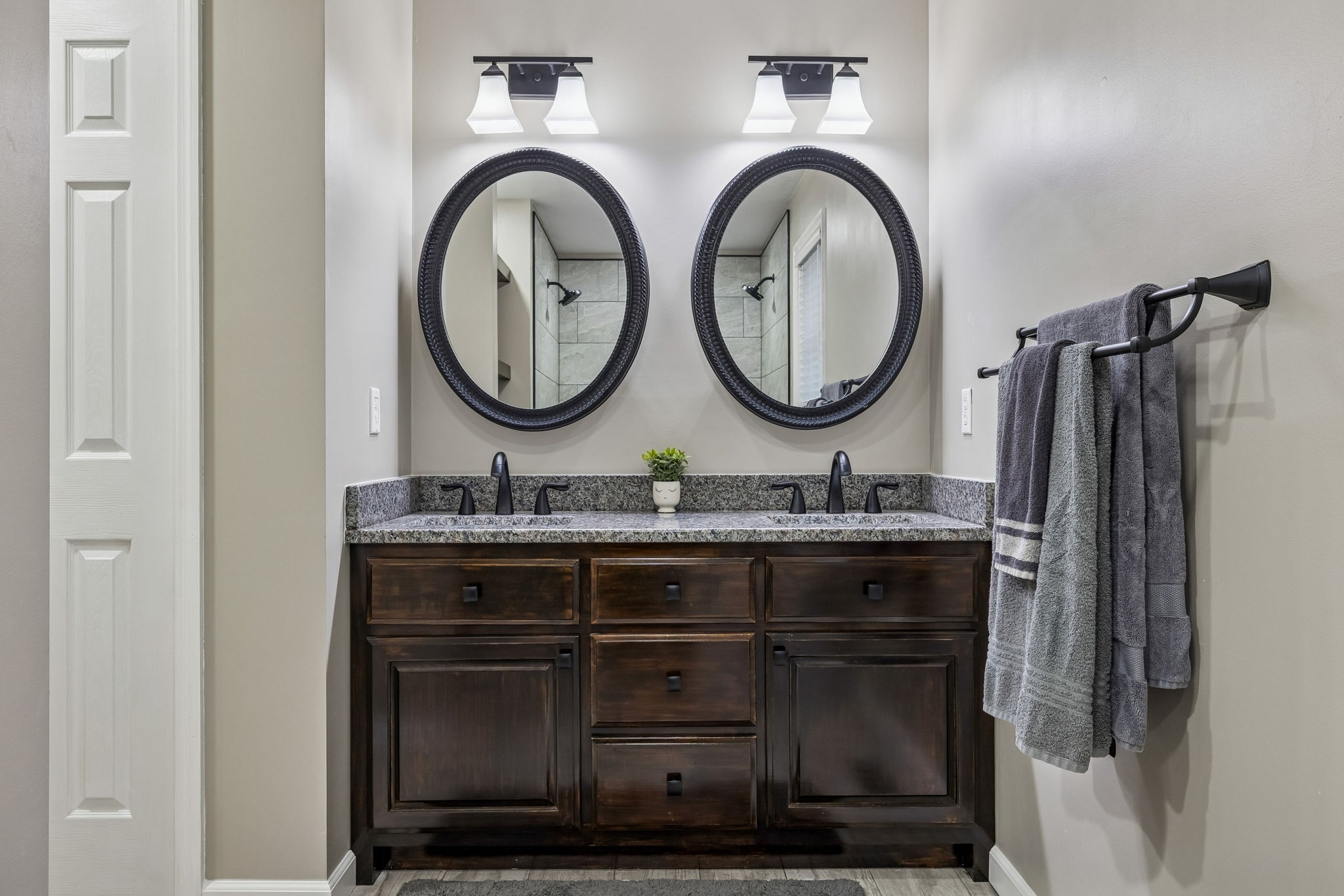 7697 Bethany Church Road Orlinda, TN 37141 - Photo 15 of 96 a bathroom with a granite countertop sink and a mirror