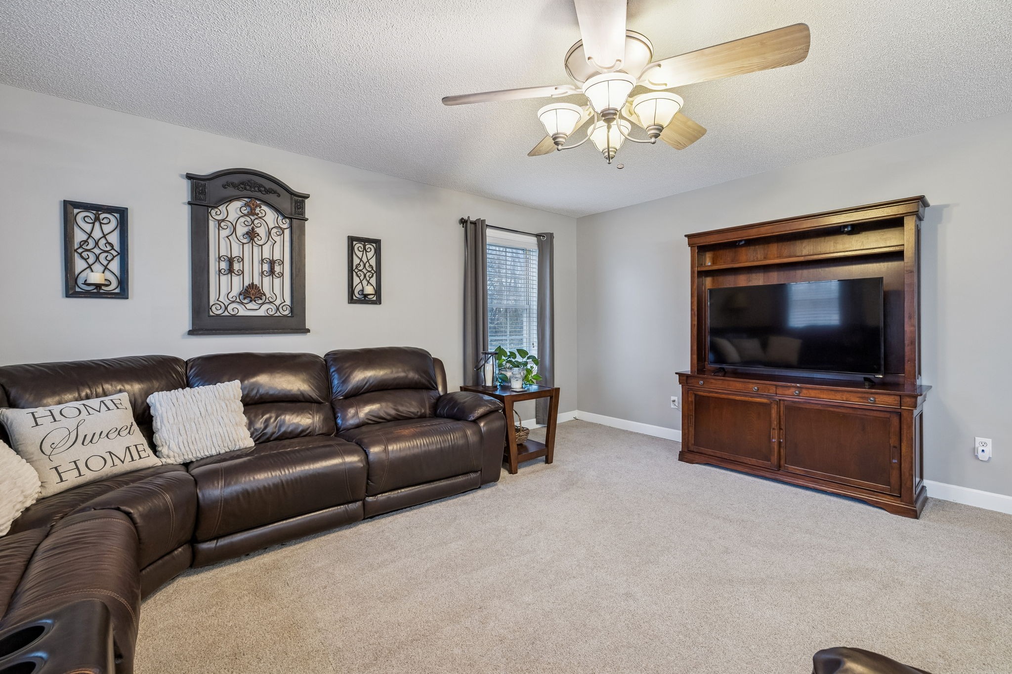 7697 Bethany Church Road Orlinda, TN 37141 - Photo 23 of 96 a living room with furniture and a flat screen tv