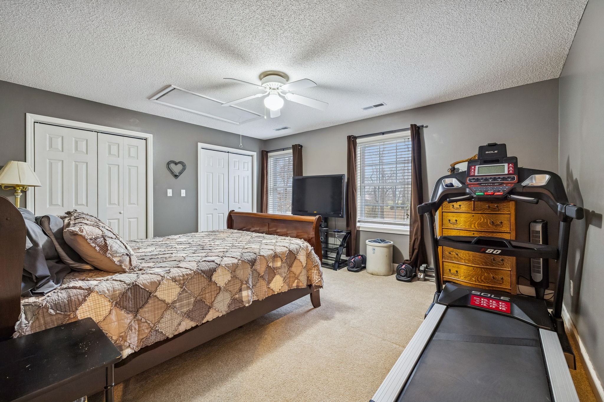7697 Bethany Church Road Orlinda, TN 37141 - Photo 29 of 96 a bedroom with bed and wooden floor