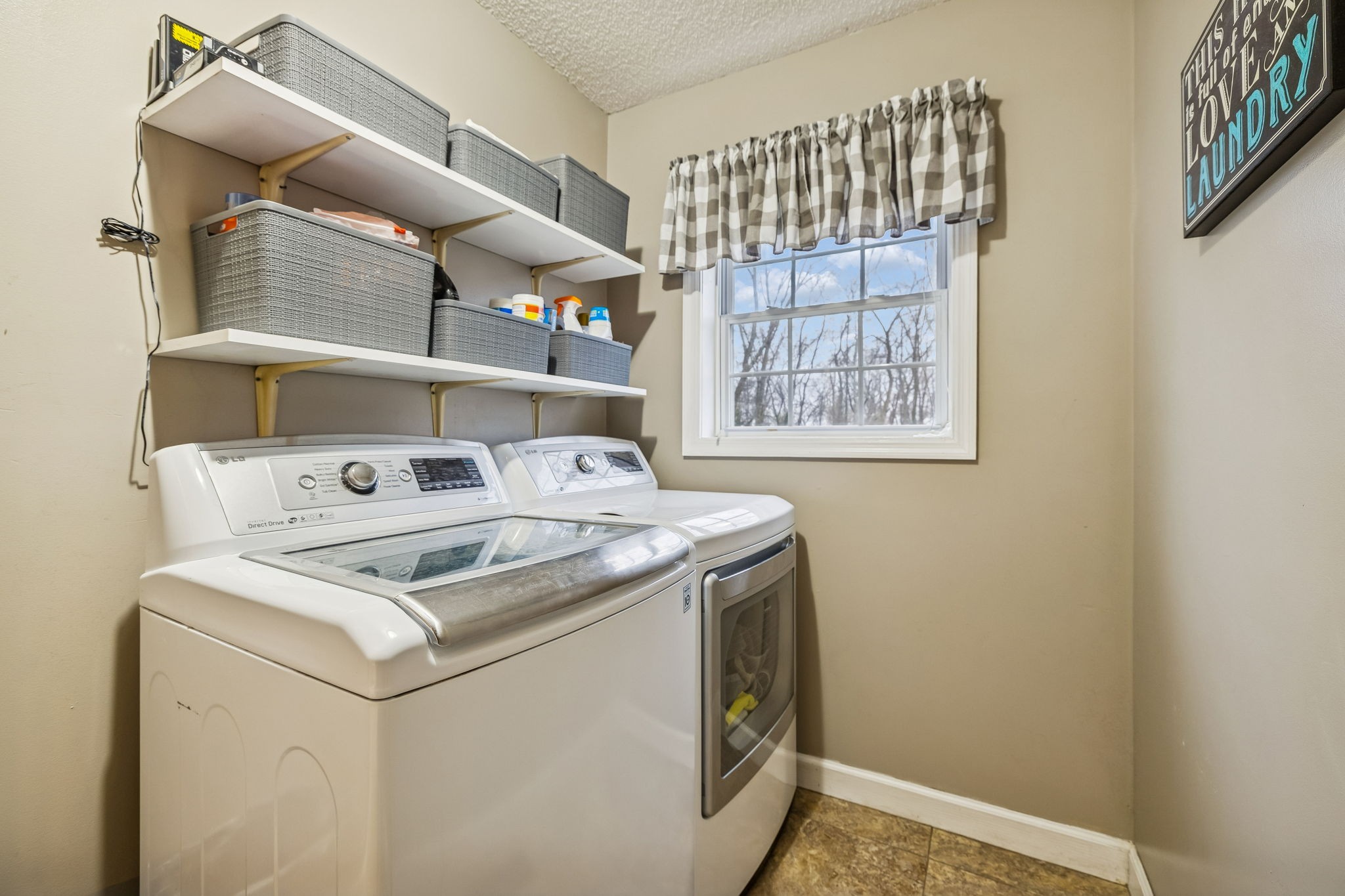 7697 Bethany Church Road Orlinda, TN 37141 - Photo 33 of 96 a utility room with dryer and washer