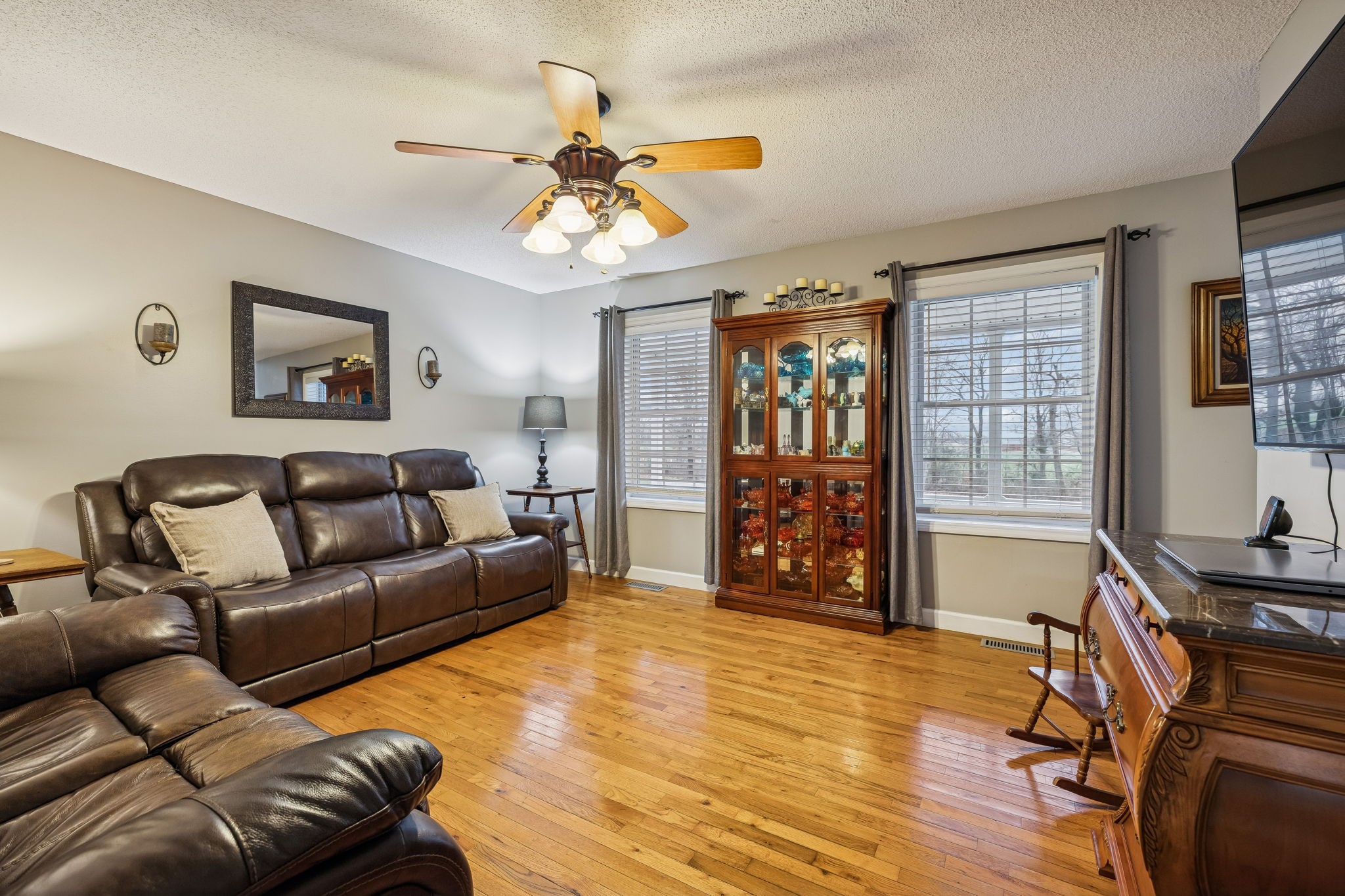 7697 Bethany Church Road Orlinda, TN 37141 - Photo 34 of 96 a living room with furniture and wooden floor