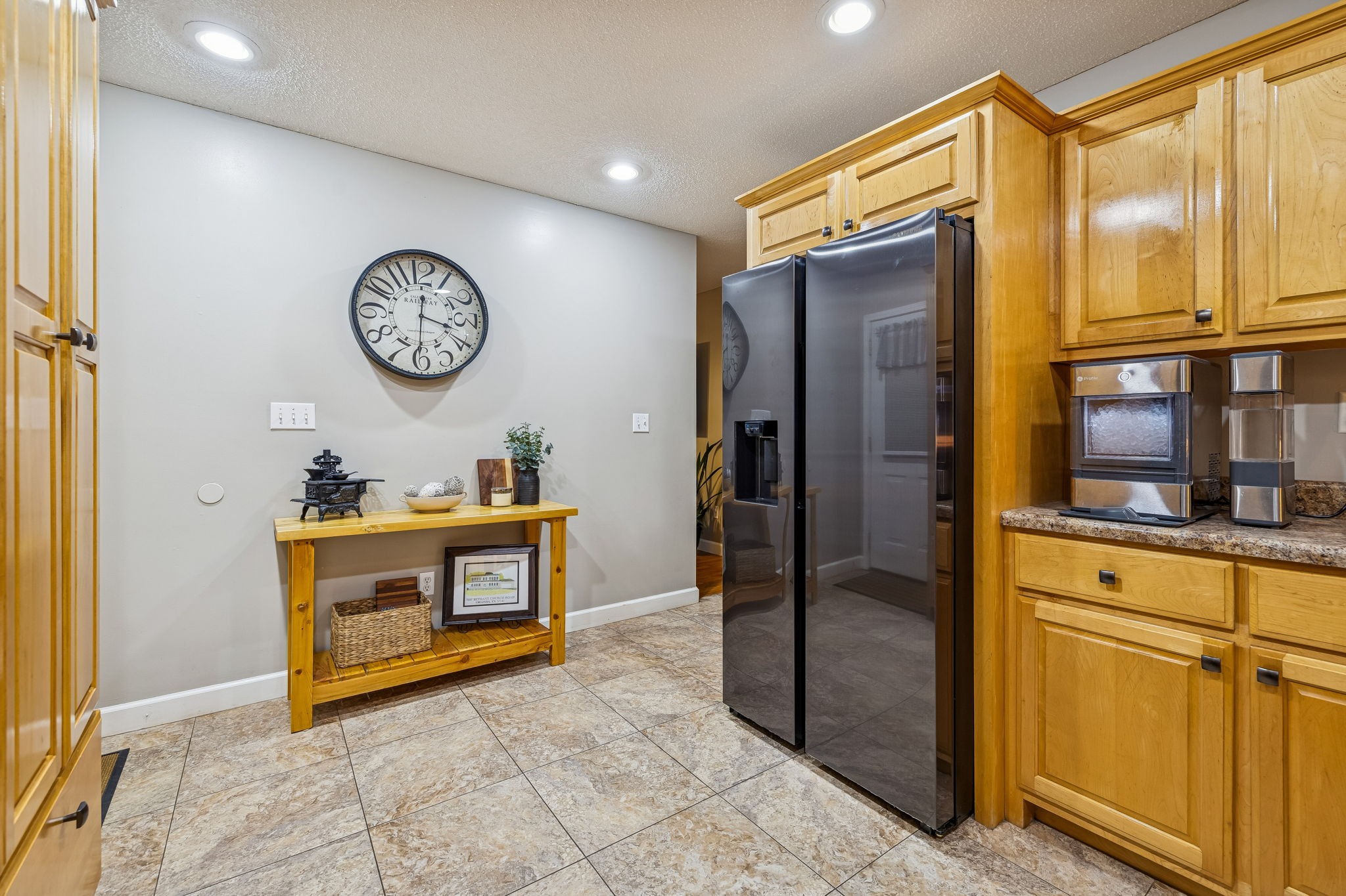 7697 Bethany Church Road Orlinda, TN 37141 - Photo 40 of 96 a kitchen with stainless steel appliances granite countertop a refrigerator and a stove