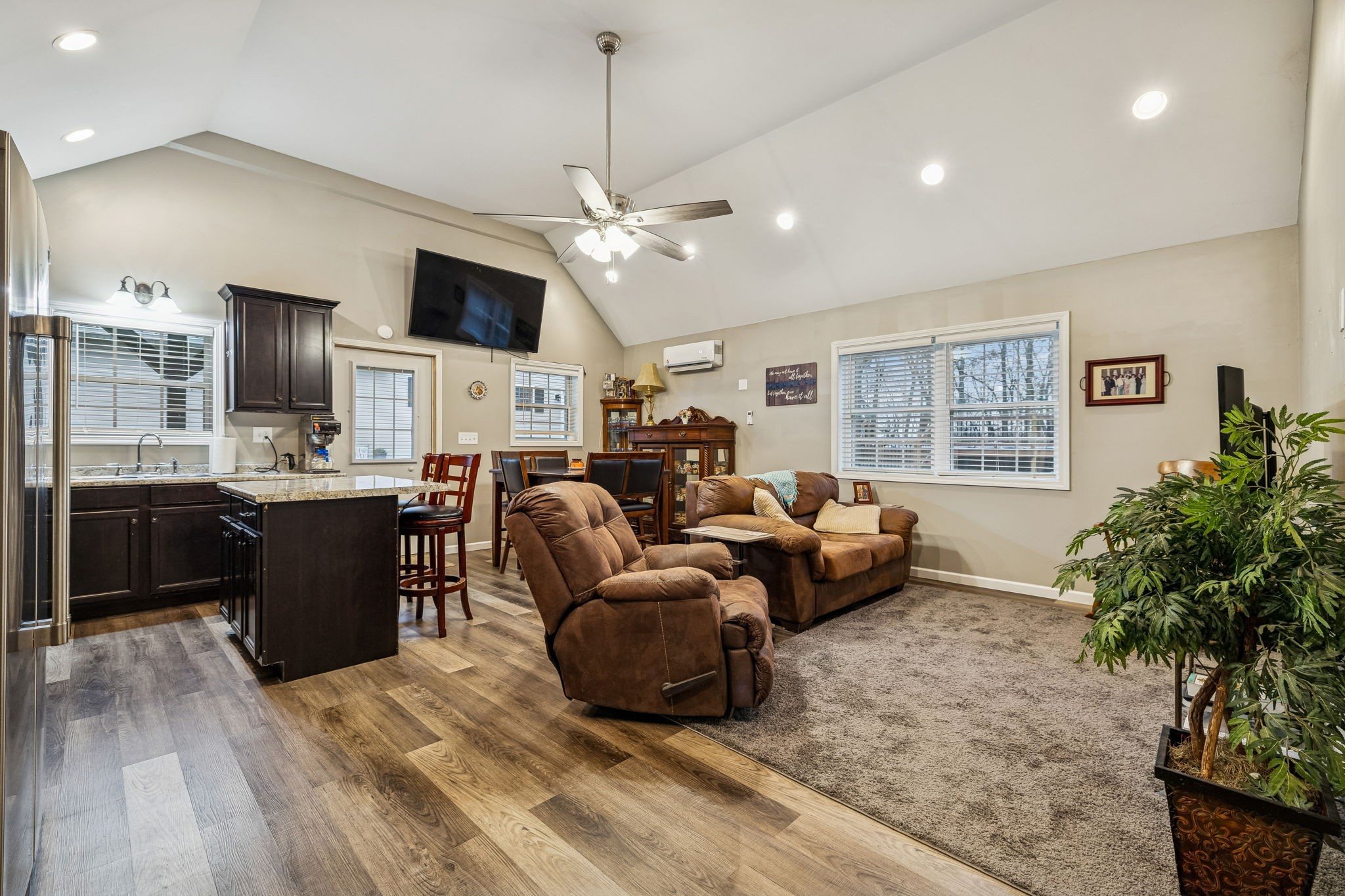 7697 Bethany Church Road Orlinda, TN 37141 - Photo 41 of 96 a living room with furniture kitchen and a chandelier