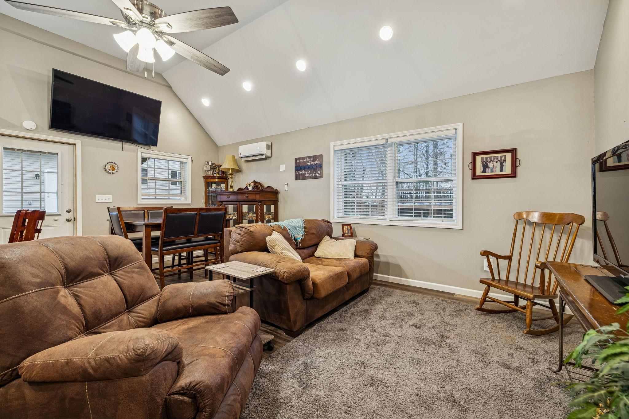 7697 Bethany Church Road Orlinda, TN 37141 - Photo 42 of 96 a living room with furniture a flat screen tv and a window