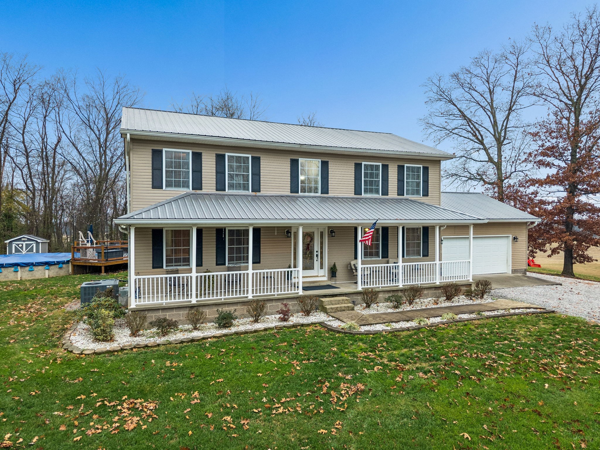 7697 Bethany Church Road Orlinda, TN 37141 - Photo 5 of 96 a front view of a house with a yard