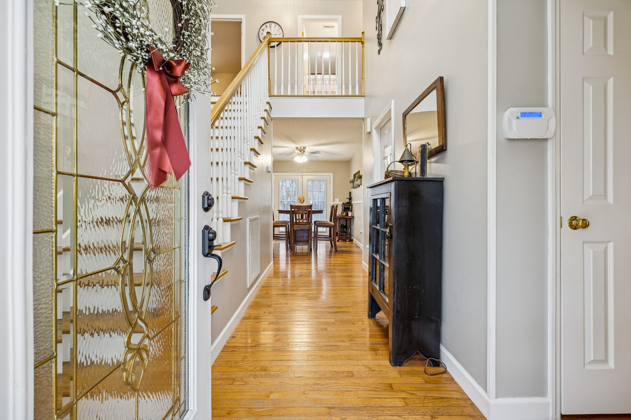 7697 Bethany Church Road Orlinda, TN 37141 - Photo 8 of 96 a view of a hallway with wooden floor and staircase