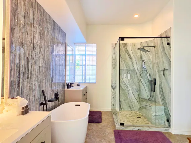 a living room with furniture and a dresser