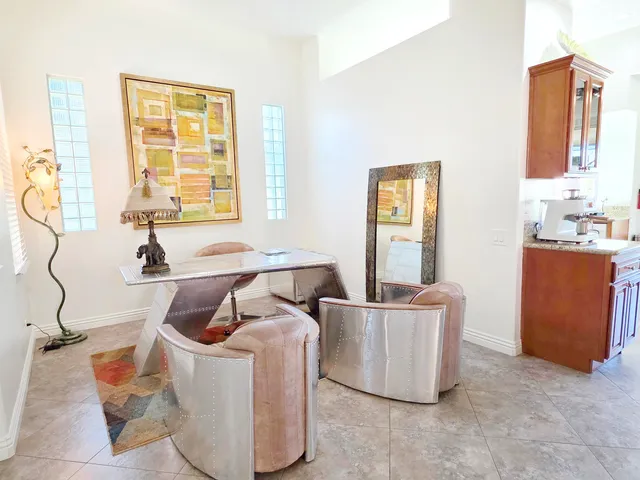 a living room with furniture and window