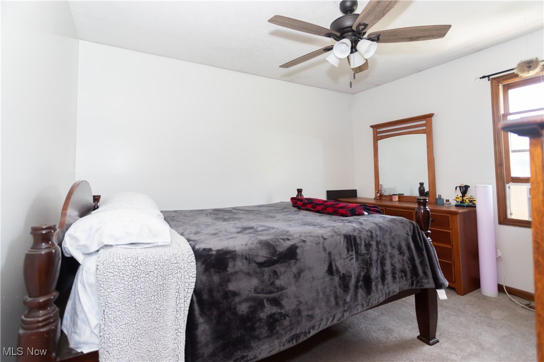 4171 Laubert Road Atwater, OH 44201 - Photo 16 of 42 2nd bedroom carpeted featuring ceiling fan