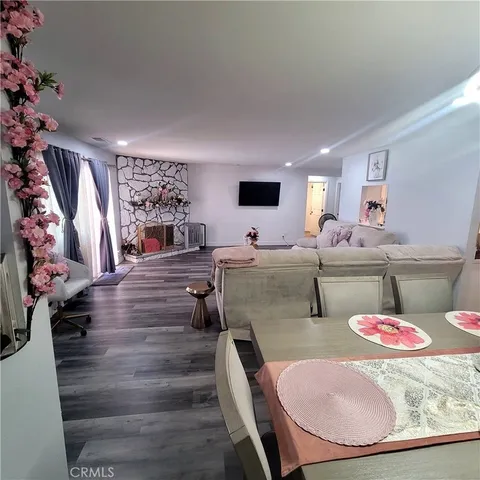 a living room with furniture and a table