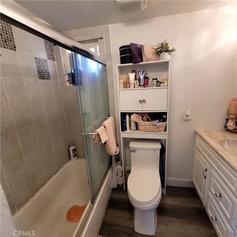 a bathroom with a sink and toilet