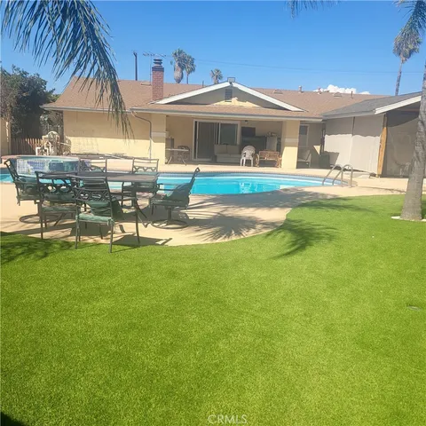 a view of a house with a swimming pool