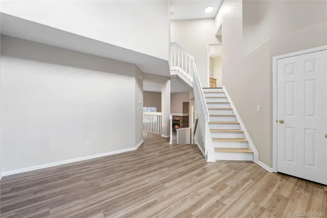 a view of entryway with wooden floor