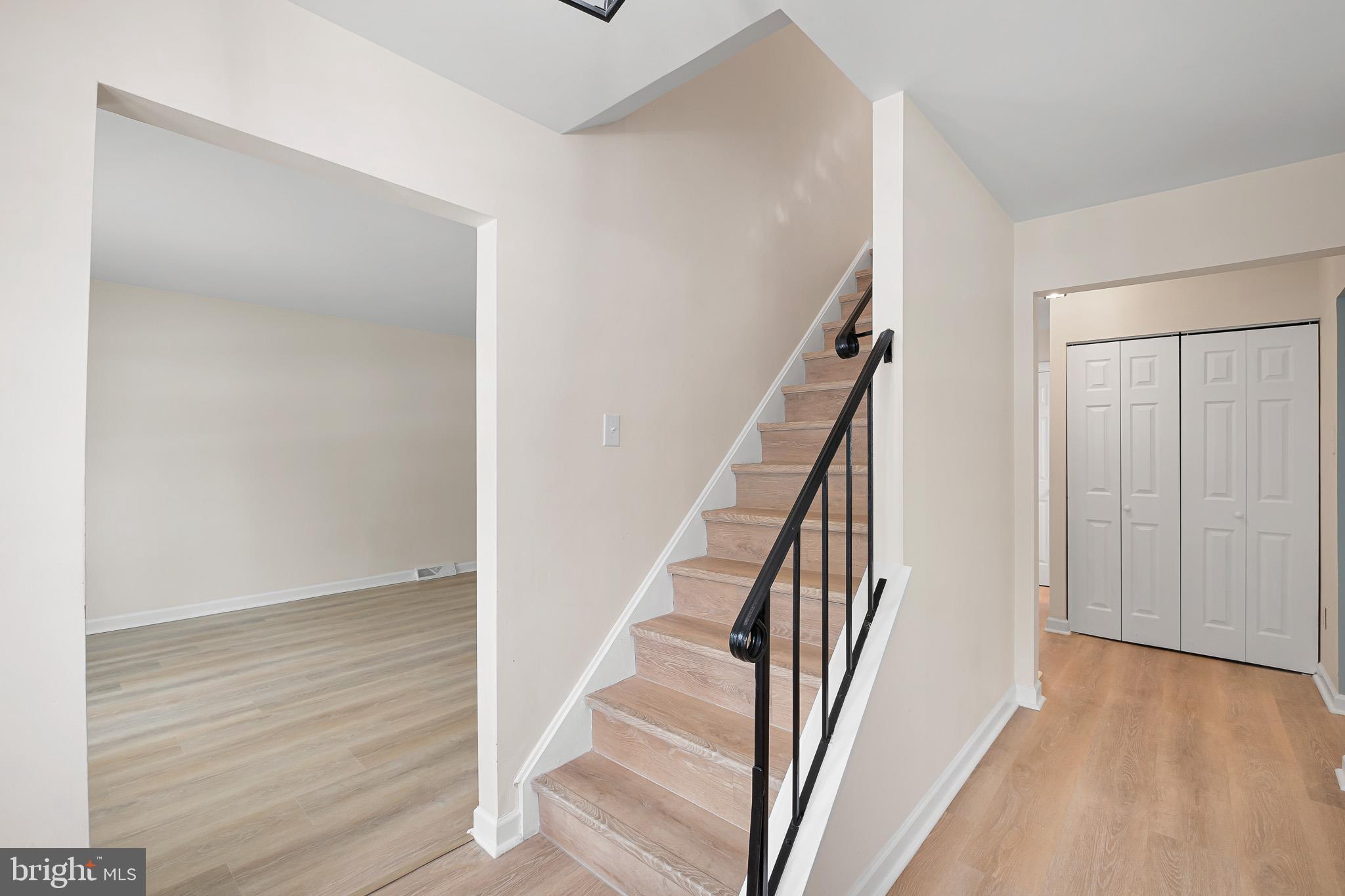2920 Cheshire Road Wilmington, DE 19810 - Photo 17 of 34 a view of entryway with wooden floor and stairs