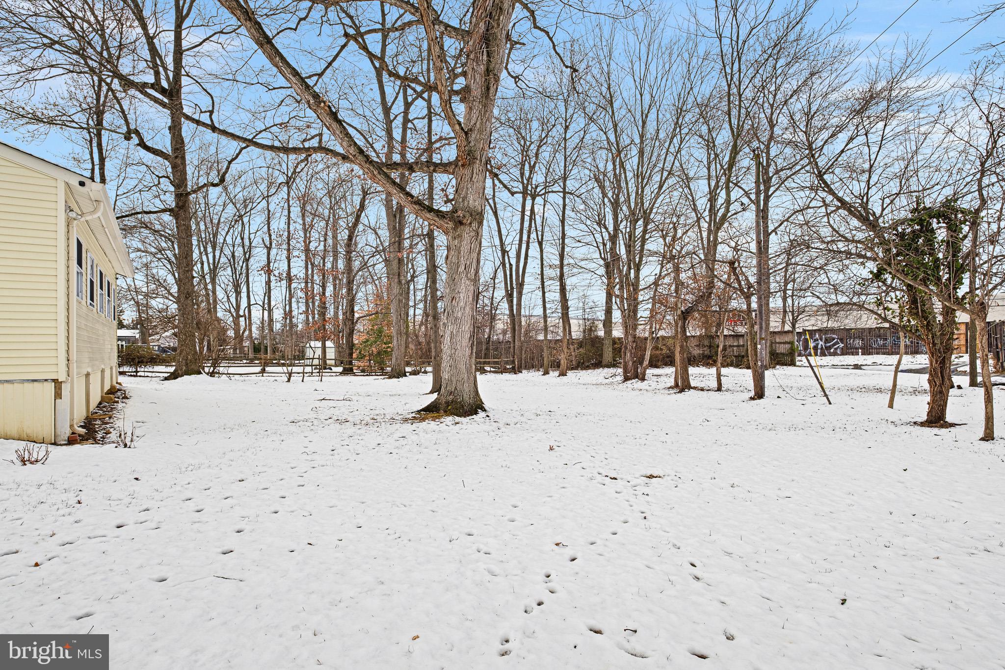 2920 Cheshire Road Wilmington, DE 19810 - Photo 29 of 34 a street view covered with snow