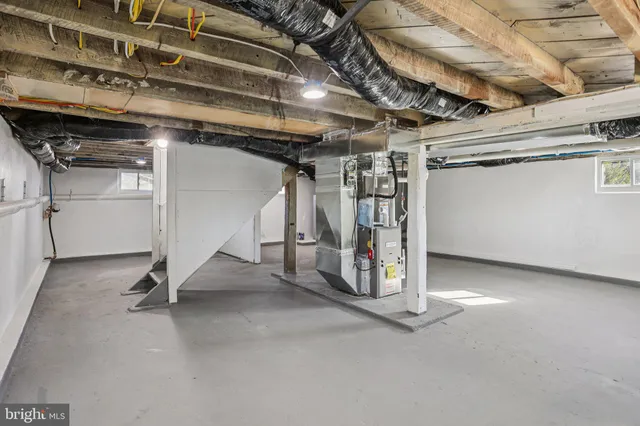 a street view with snow on the road