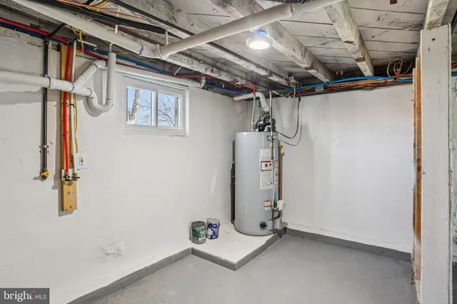 a open kitchen with stainless steel appliances granite countertop a stove and a refrigerator