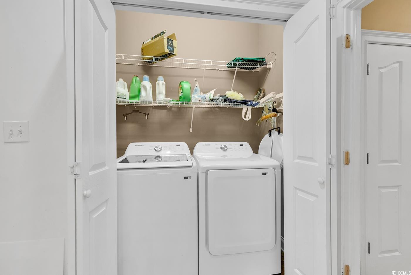 1459 St Thomas Circle, Unit F2 Myrtle Beach, SC 29577 - Photo 19 of 31 Closet with full sizewashing machine and clothes dryer