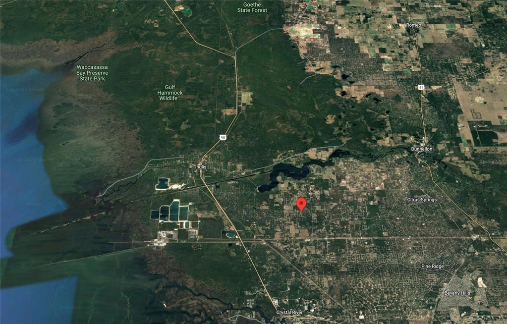 8549 North Buscetta Loop Crystal River, FL 34428 - Photo 11 of 12 an aerial view of a house