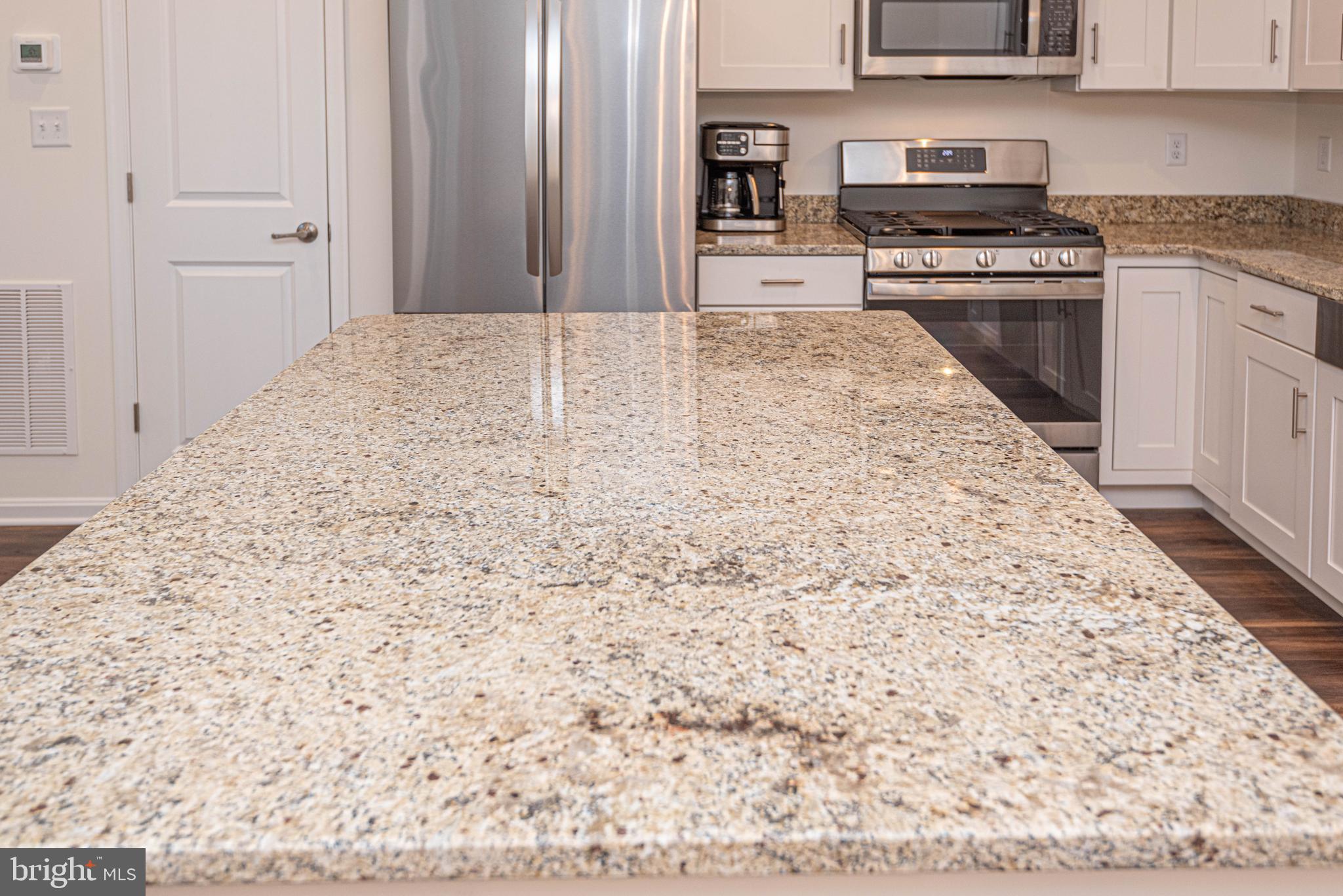 211 Prospect Street Milton, DE 19968 - Photo 18 of 64 a kitchen with a stove top oven