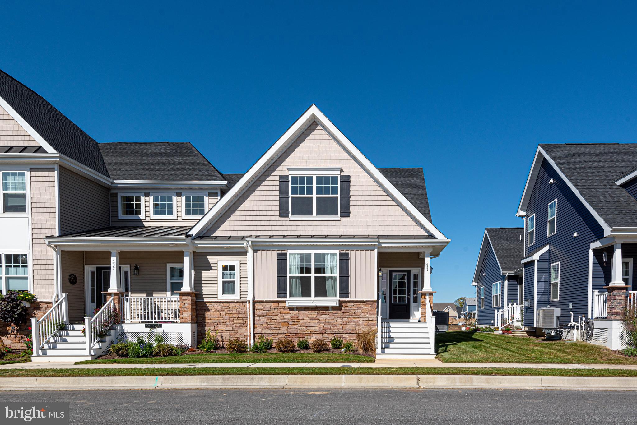 211 Prospect Street Milton, DE 19968 - Photo 2 of 64 a front view of multiple houses