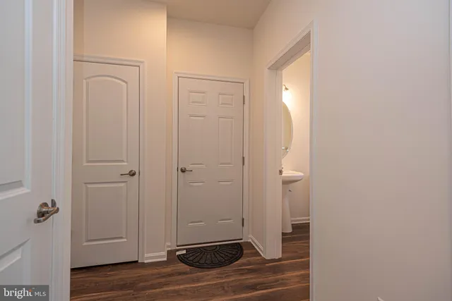 a bathroom with a toilet sink and shower