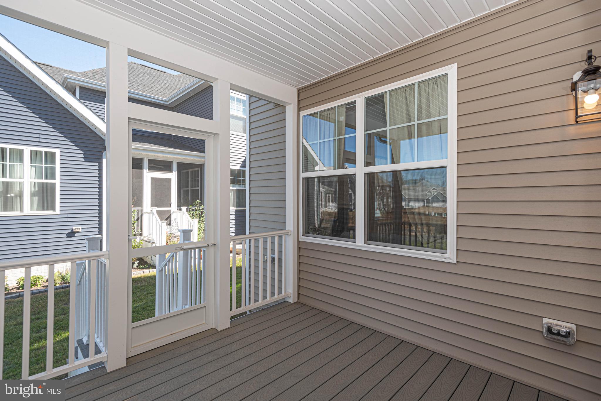 211 Prospect Street Milton, DE 19968 - Photo 26 of 64 a view of a house with wooden deck