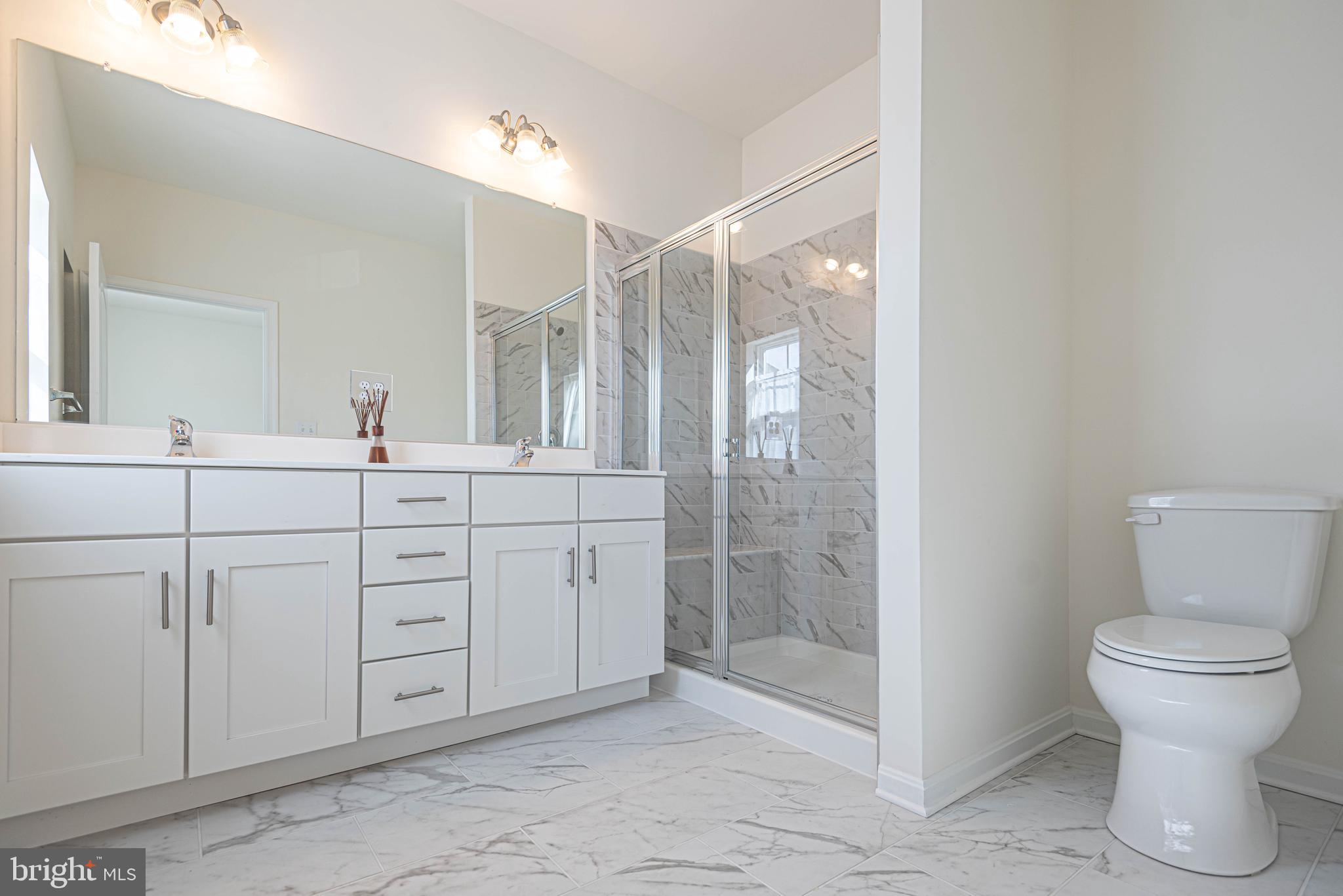 211 Prospect Street Milton, DE 19968 - Photo 30 of 64 a bathroom with a toilet sink and shower