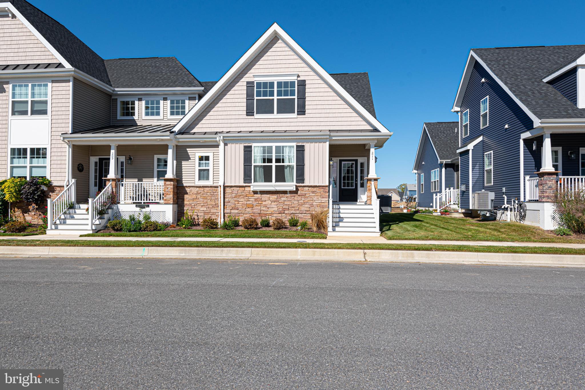 211 Prospect Street Milton, DE 19968 - Photo 3 of 64 front view of a house with a small yard