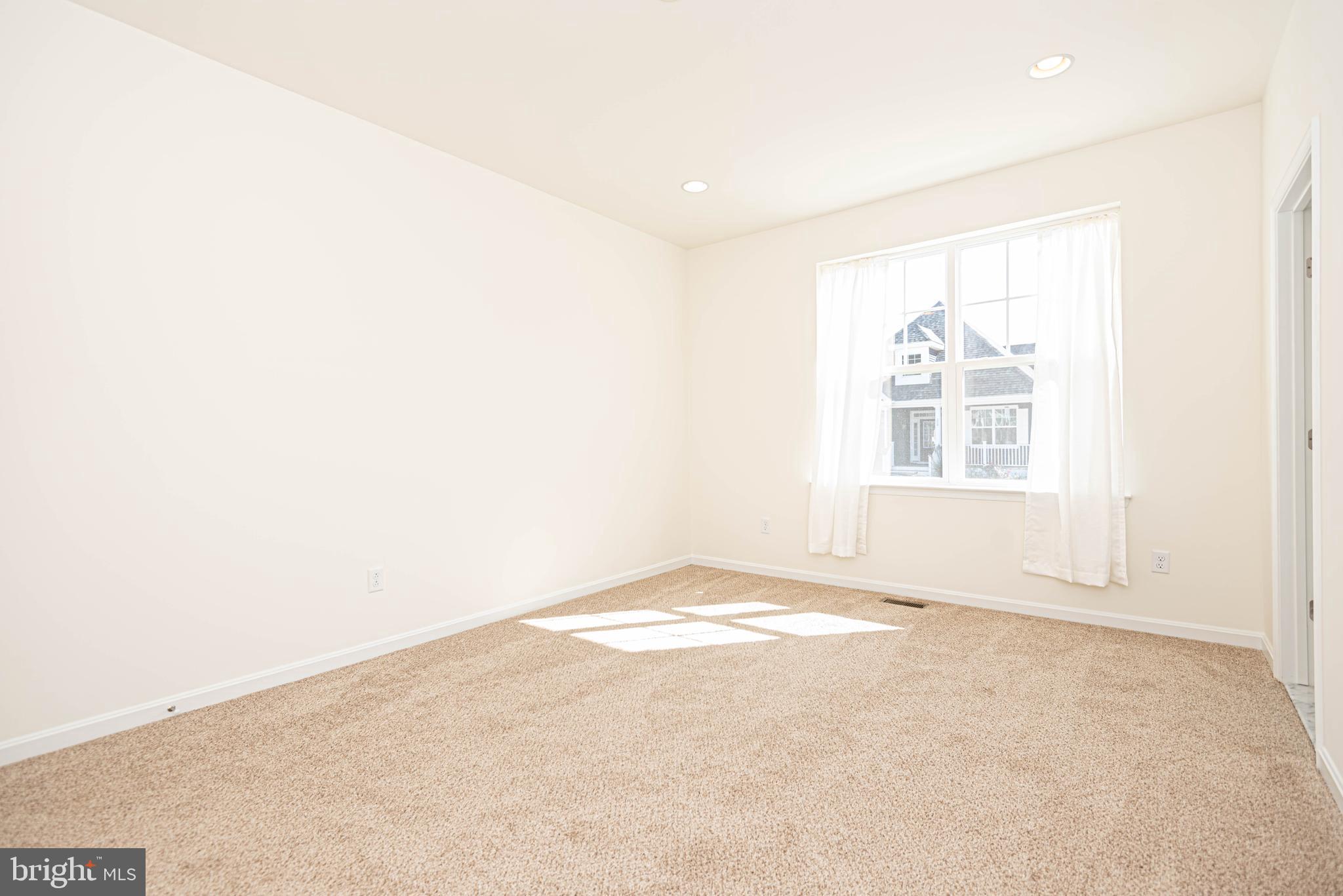 211 Prospect Street Milton, DE 19968 - Photo 36 of 64 an empty room with windows