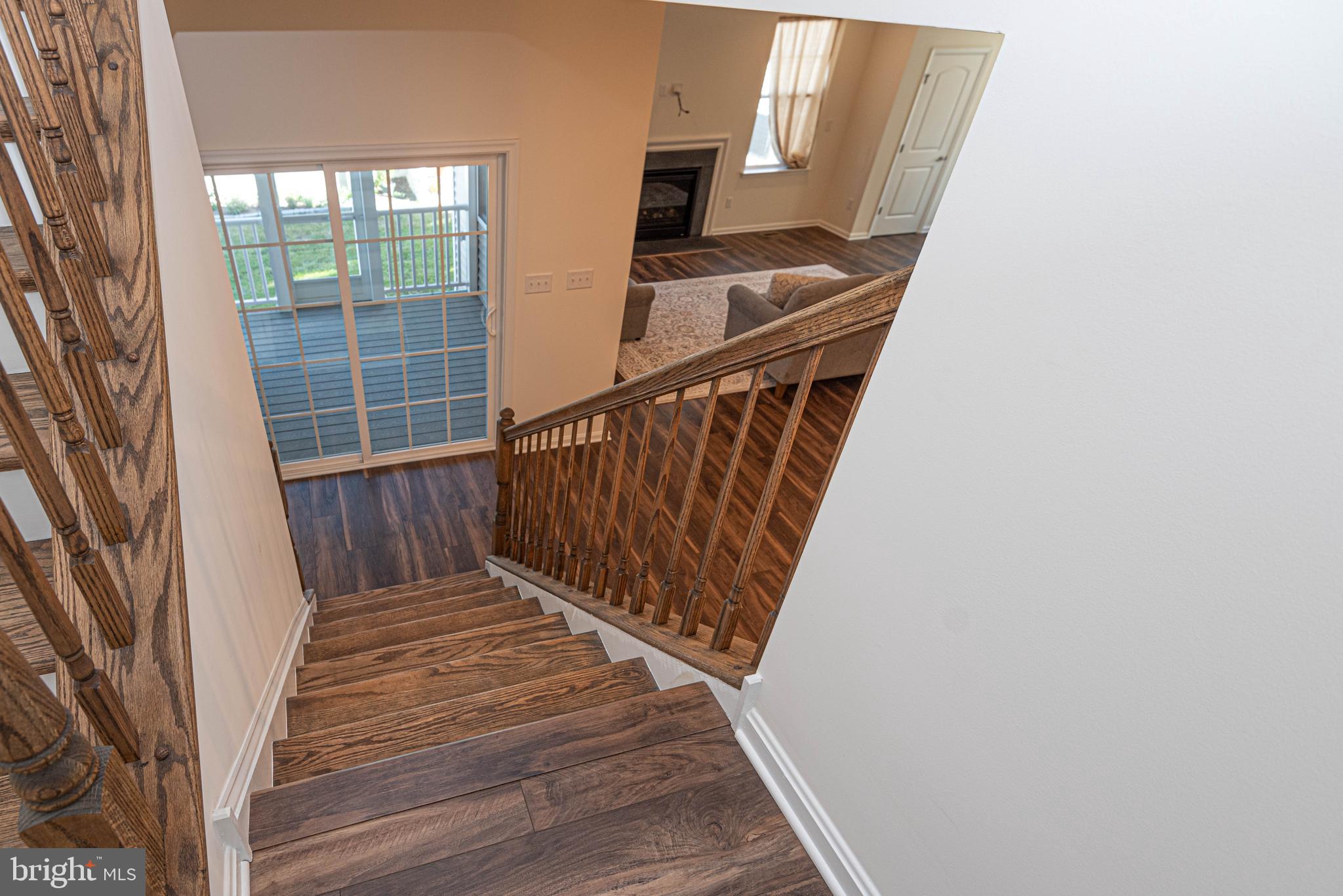 211 Prospect Street Milton, DE 19968 - Photo 40 of 64 a view of entryway with wooden floor