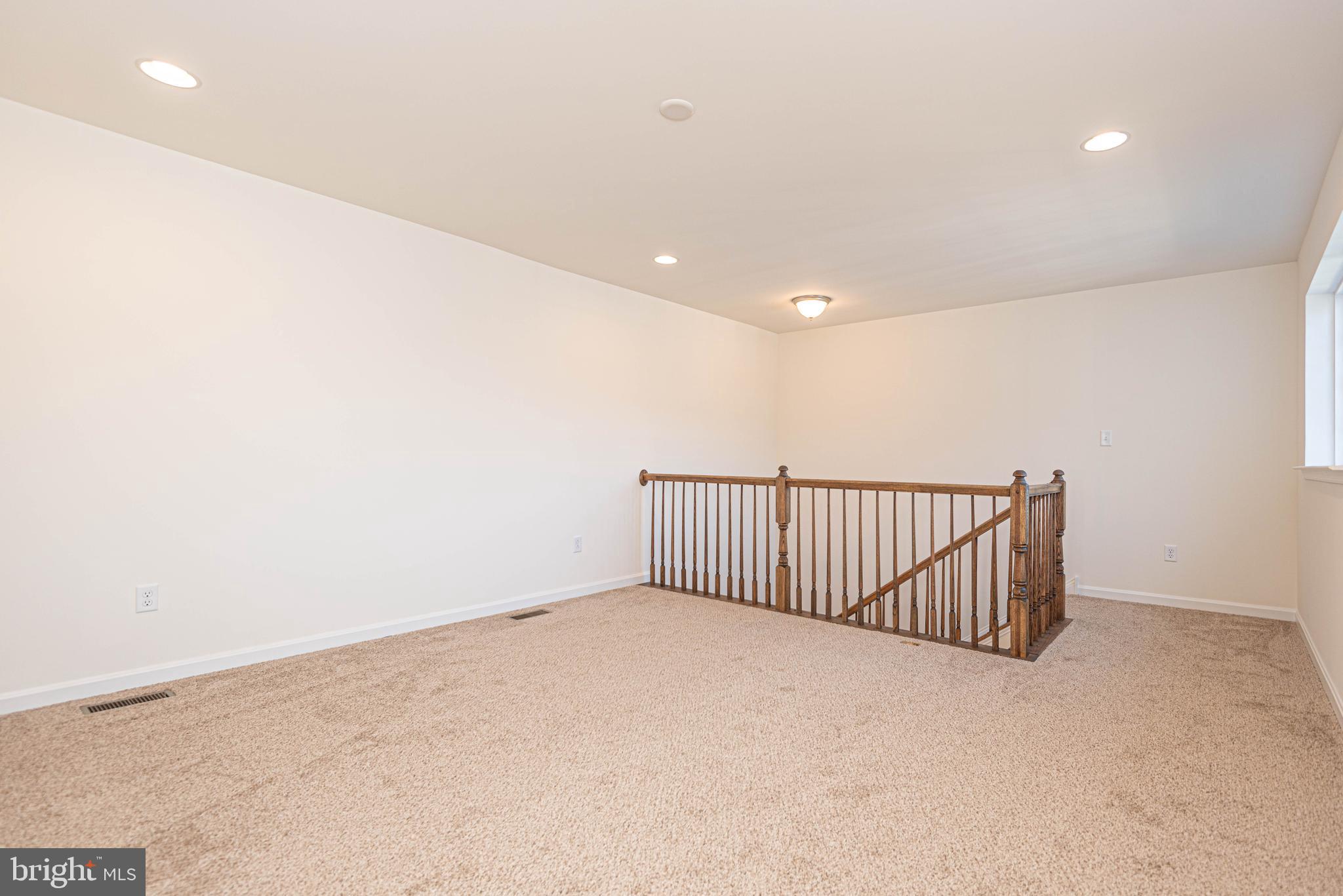 211 Prospect Street Milton, DE 19968 - Photo 44 of 64 a view of staircase with white walls