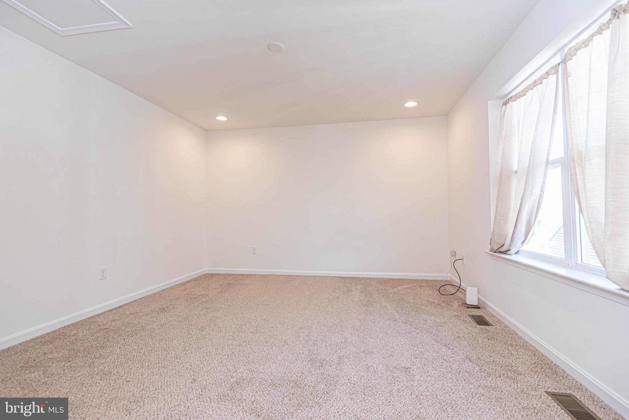 211 Prospect Street Milton, DE 19968 - Photo 51 of 64 an empty room with a window